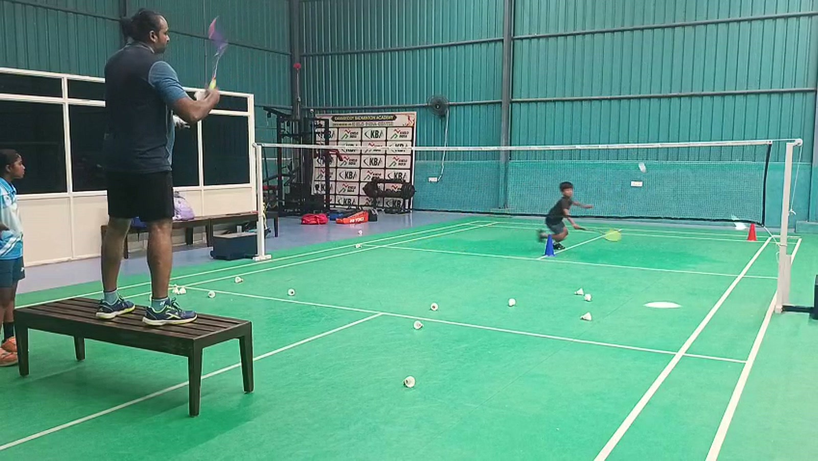 Inside Kamareddy Badminton Academy — courts and pro shop